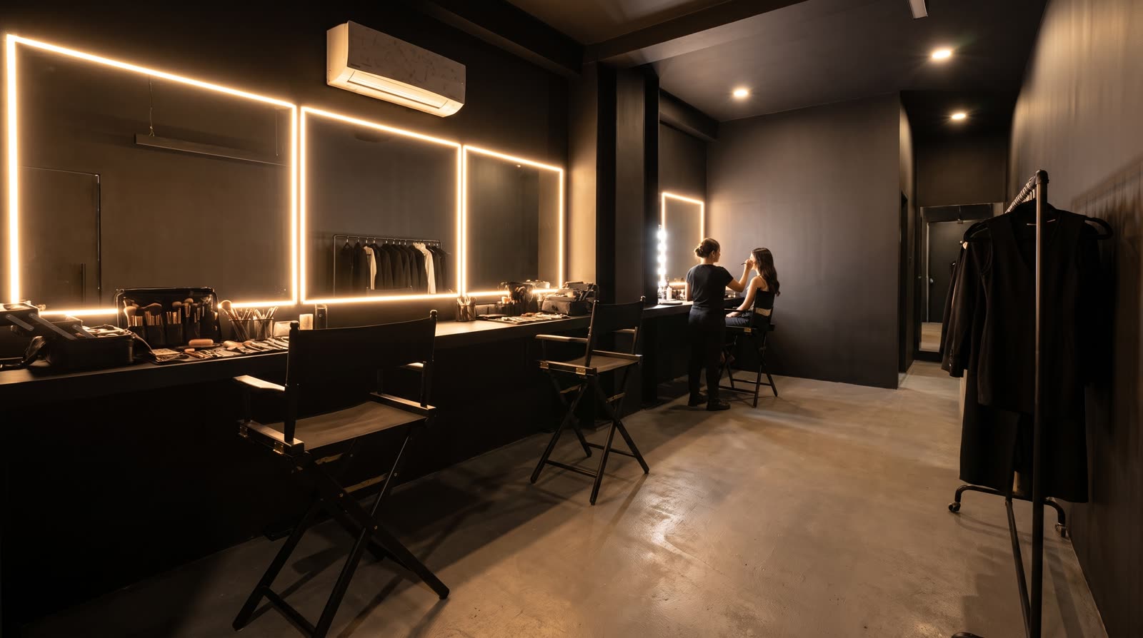 Talent dressing room with makeup vanity and lighted mirrors